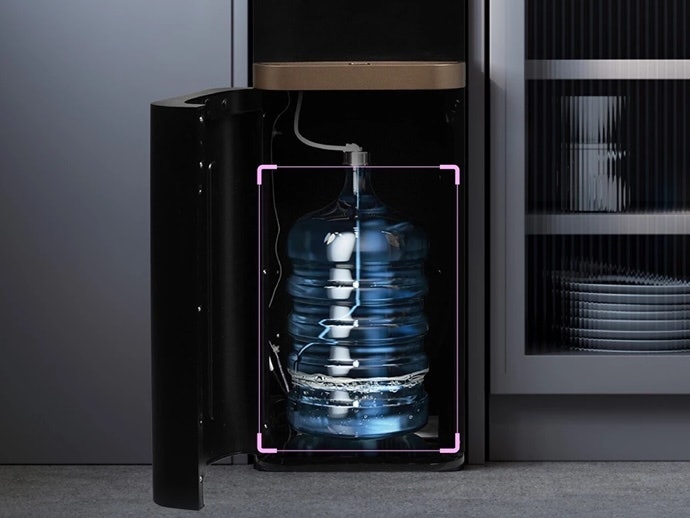 Bagaimana cara membersihkan dispenser galon bawah?