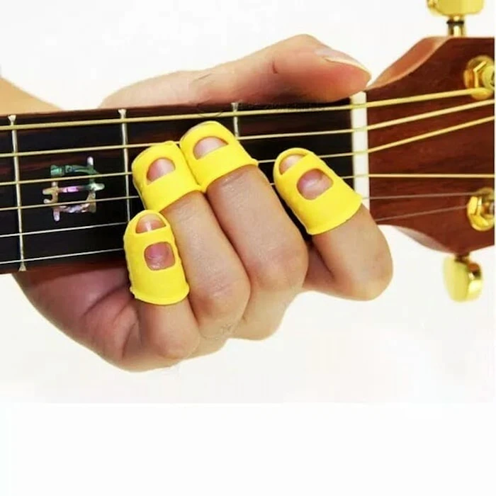 Silicone Finger Pick 4 Pcs Translation missing: id.activerecord.decorators.item_part_image/alt