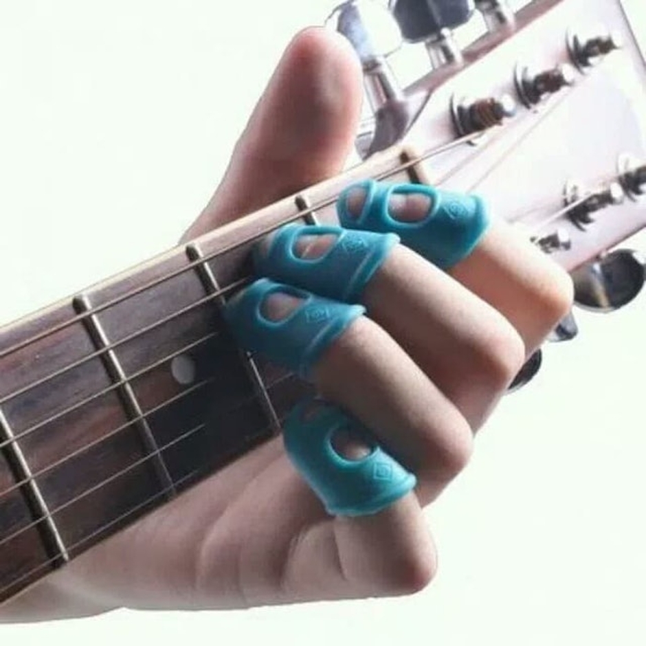 Silicone Finger Pick 4 Pcs Translation missing: id.activerecord.decorators.item_part_image/alt