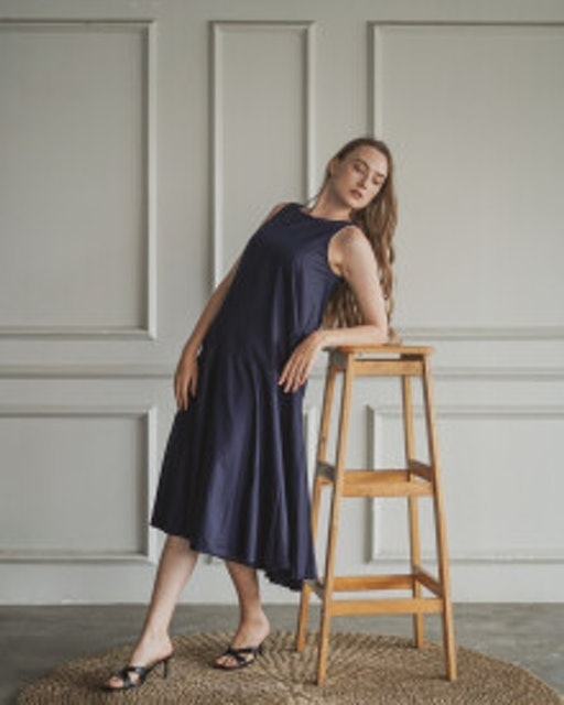 This is April Cielo Ruffle Hem Navy Dress 777204