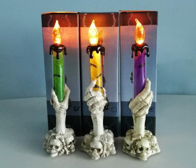 Lampu Lilin Tangan Tengkorak 1