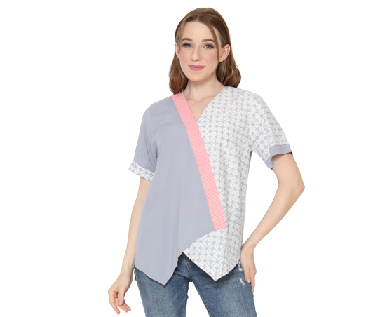 Untuk gaya etnik kasual, pilih model baju batik kombinasi modern dengan cutting edgy