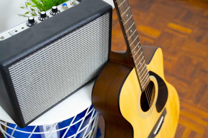 Cek suara gitar saat dimainkan dengan dan tanpa amplifier