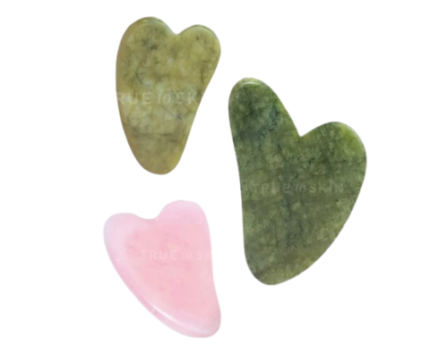 Pilih gua sha yang terbuat dari batu alam, seperti giok dan rose quartz