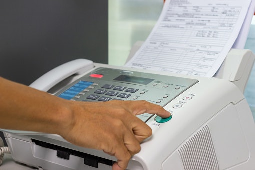 Pertimbangkan mesin fax yang dilengkapi telepon untuk membuat dan menerima panggilan