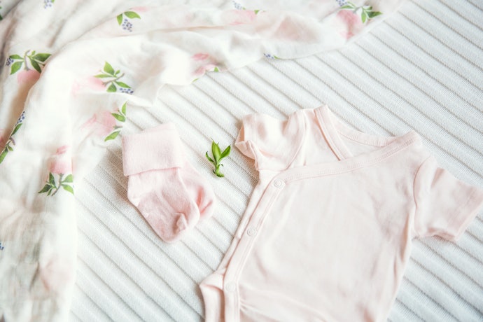 Kancing bukaan depan: Disarankan untuk bayi baru lahir