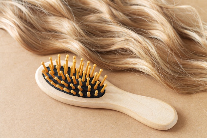 Paddle brush: Sisir paling umum untuk digunakan