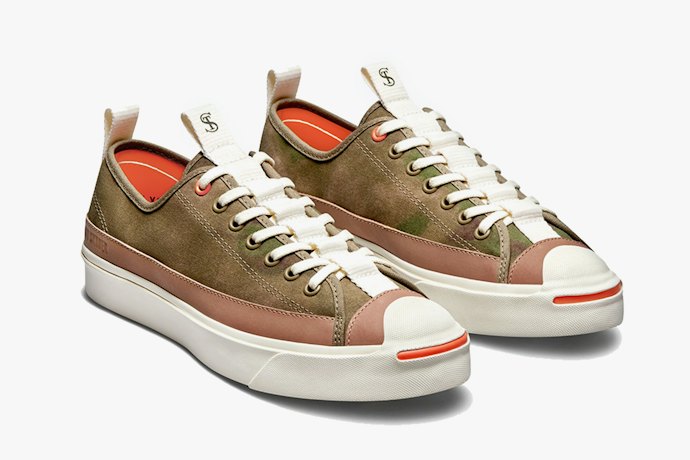Jack Purcell, memiliki bantalan lebih tinggi dan detail smile