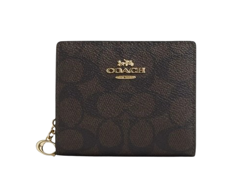 Coach: Simpel dan elegan dengan bahan signature canvas khas Coach