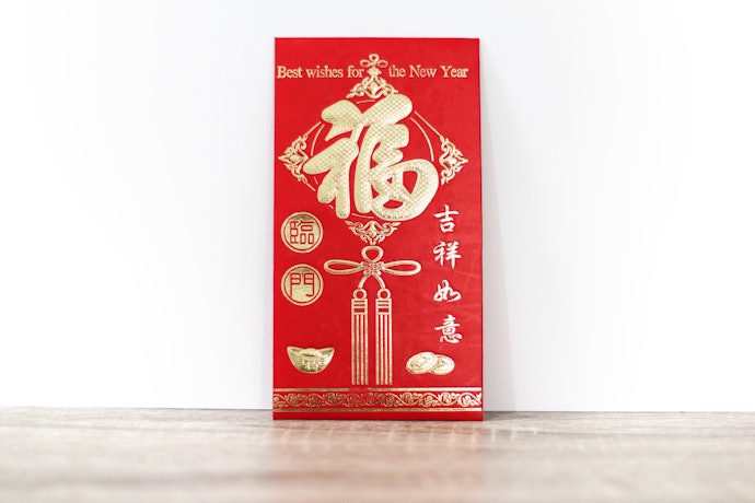 Angpao Imlek, khas dengan gambar shio dan simbol keberuntungan