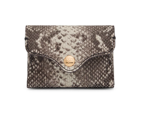 Fossil: Terbuat dari material eco leather dengan emboss unik seperti kulit ular