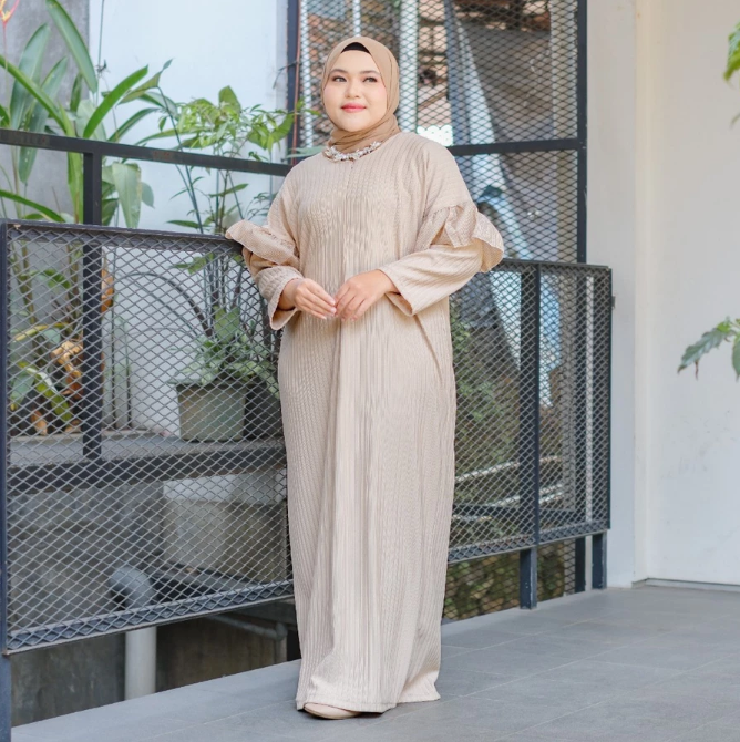 Model loose berpotongan lurus: Menyamarkan bentuk tubuh secara keseluruhan